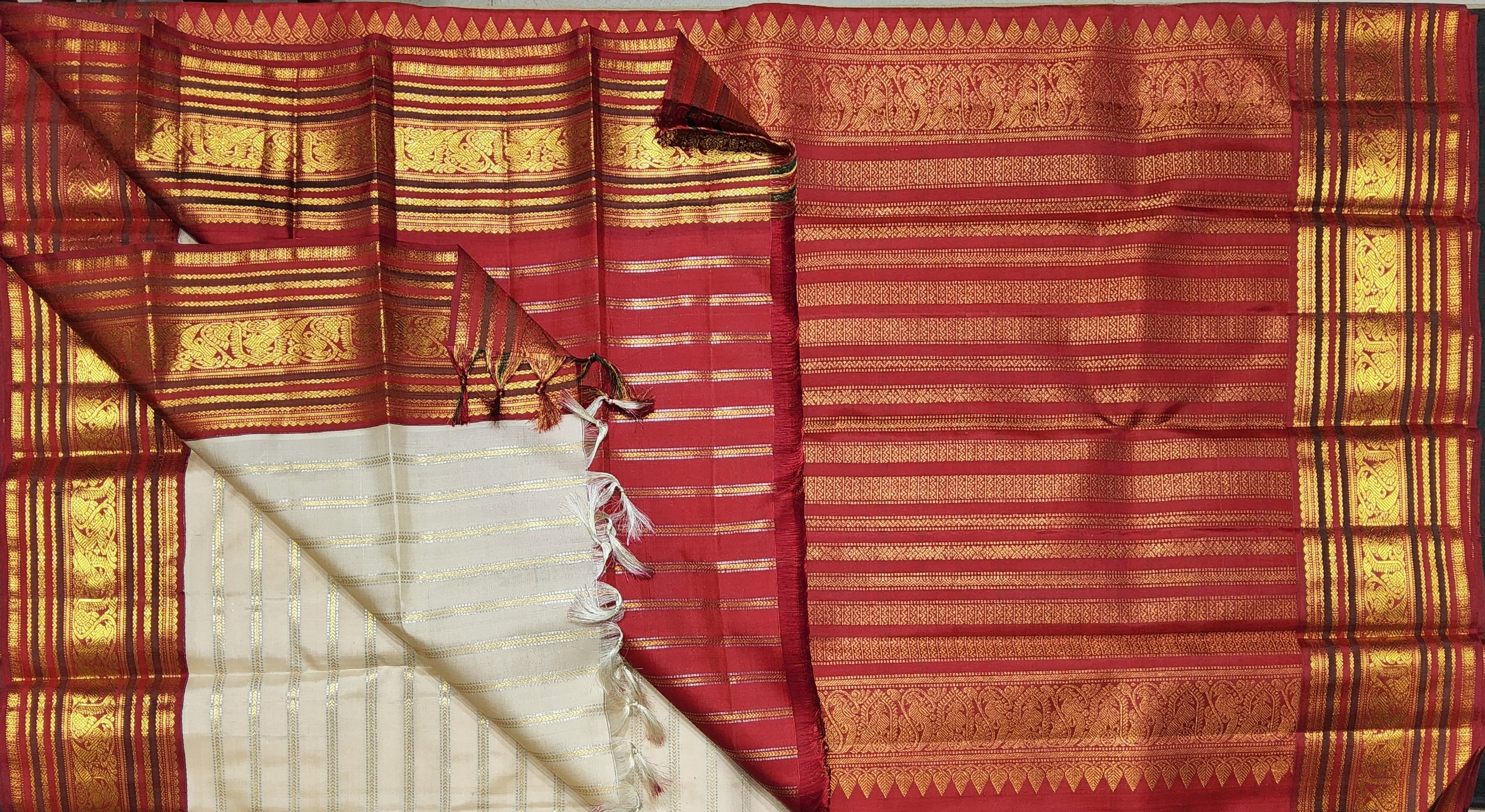 Full view of off-white Kanchipuram authentic silk saree, maroon border; perfect for bharatanatyam practice saree.
