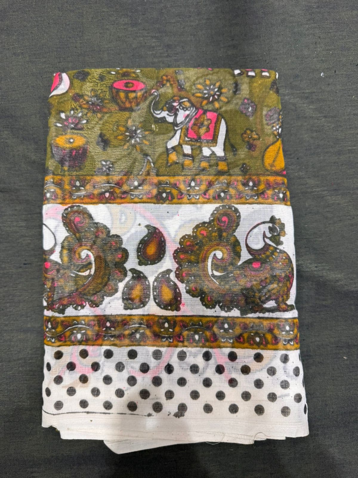 Close-up of Kalamkari Bharatanatyam dress fabric, elephant motif. Cotton blend practice saree.