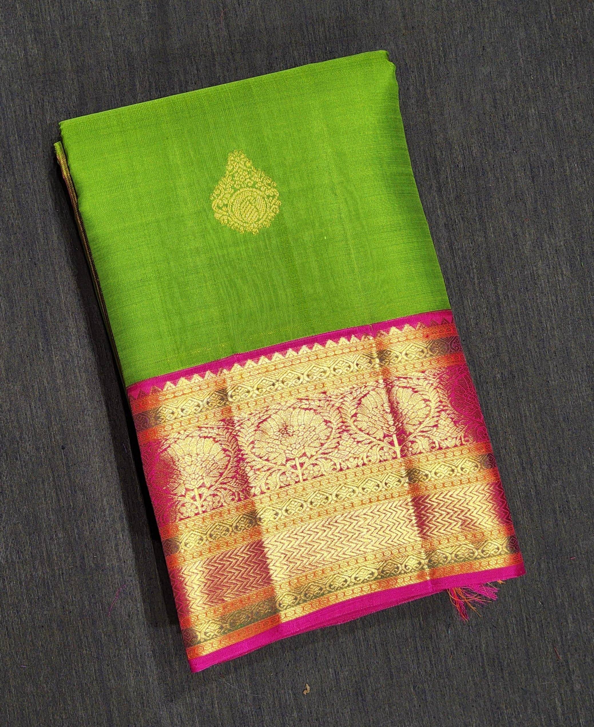 Green Kanchipuram authentic silk saree with gold zari buttas, perfect arangetram saree.