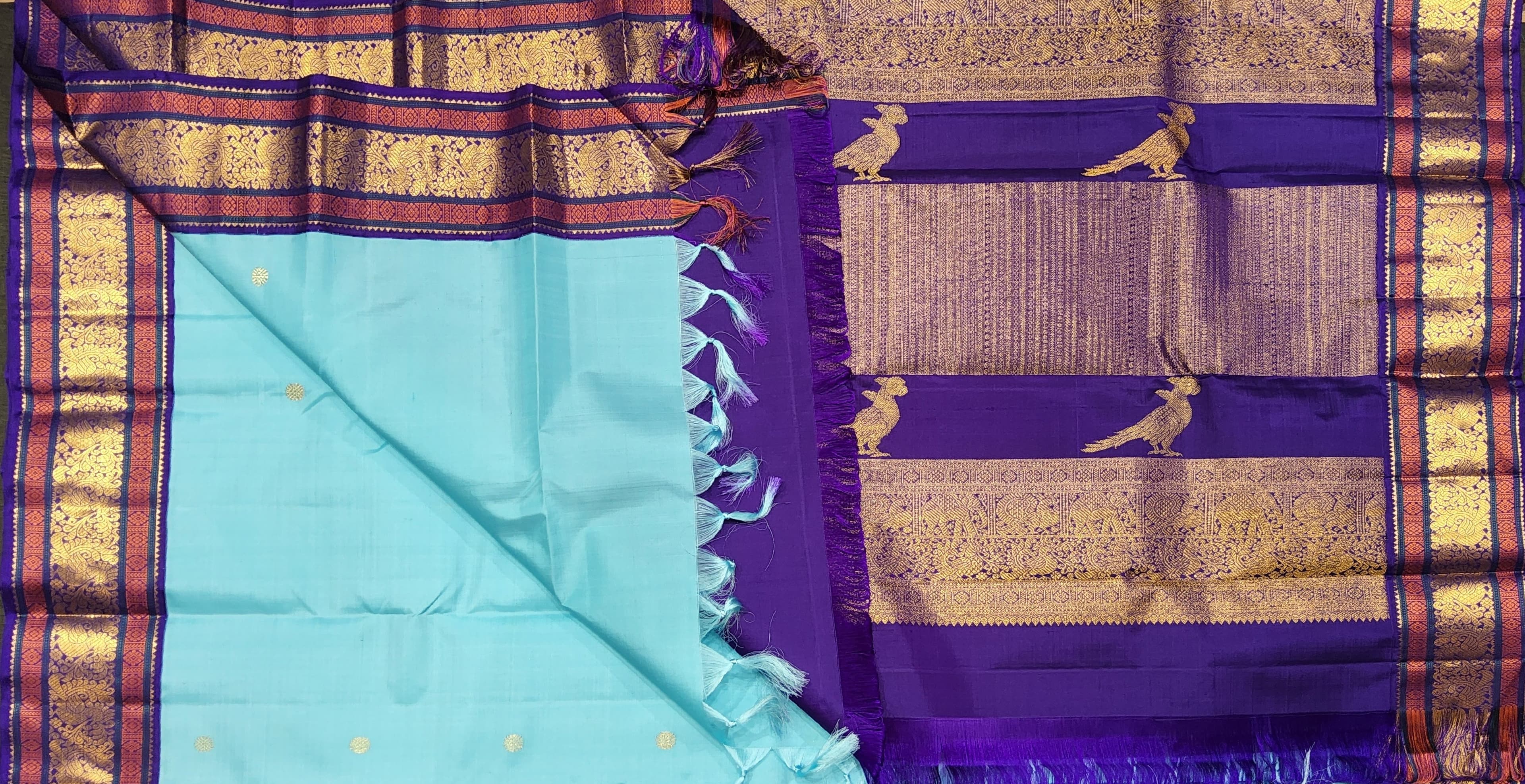 Royal purple Kanchipuram authentic silk saree blouse piece with zari border, arangetram costume detail.
