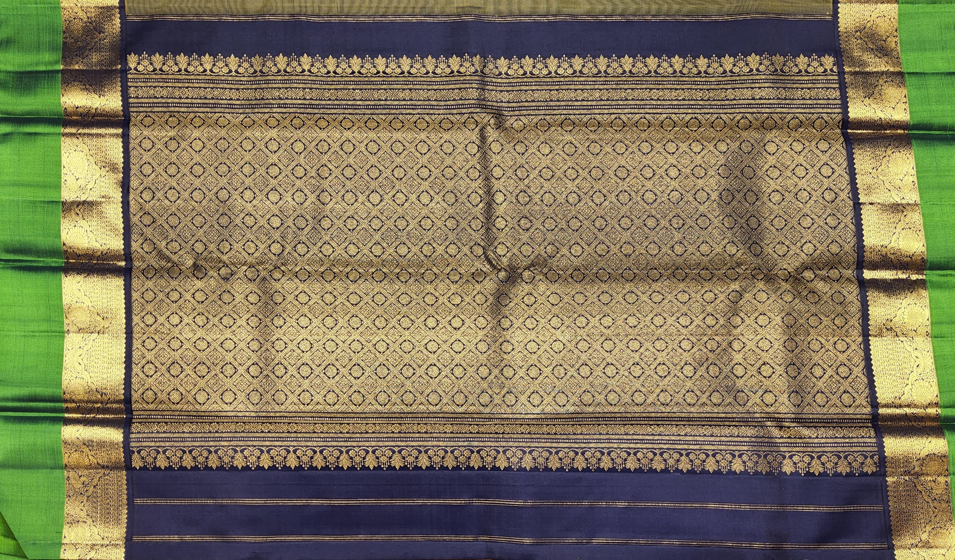 Yellow Kanchipuram authentic silk saree close-up. Zari detail, Arangetram, Bharatanatyam practice saree.
