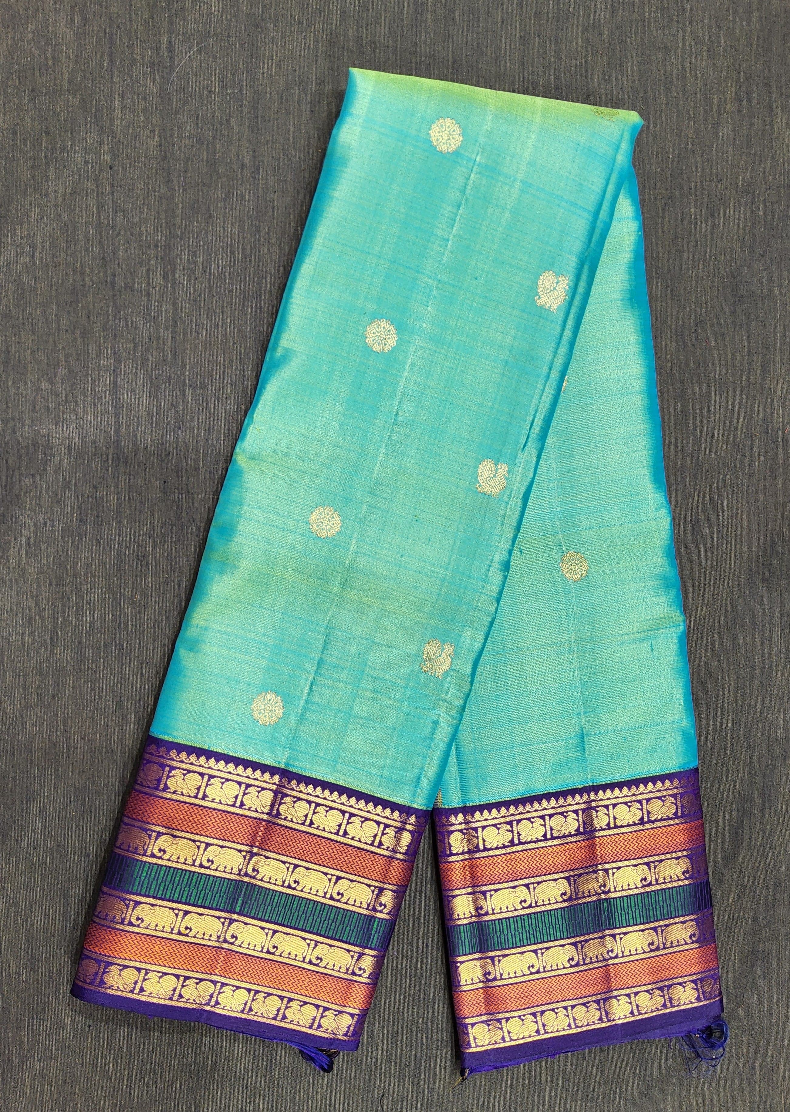Close-up of gold zari diamond pattern on Ramar Blue authentic silk Kanchipuram saree, Arangetram