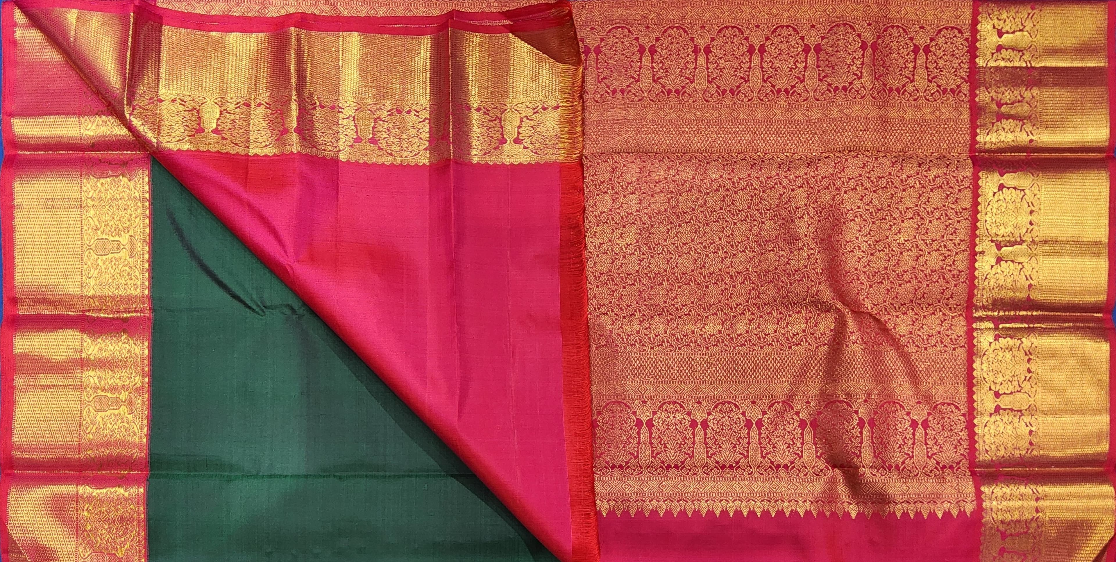 Authentic silk Kanchipuram saree, green body, pink border, gold zari, dance practice saree