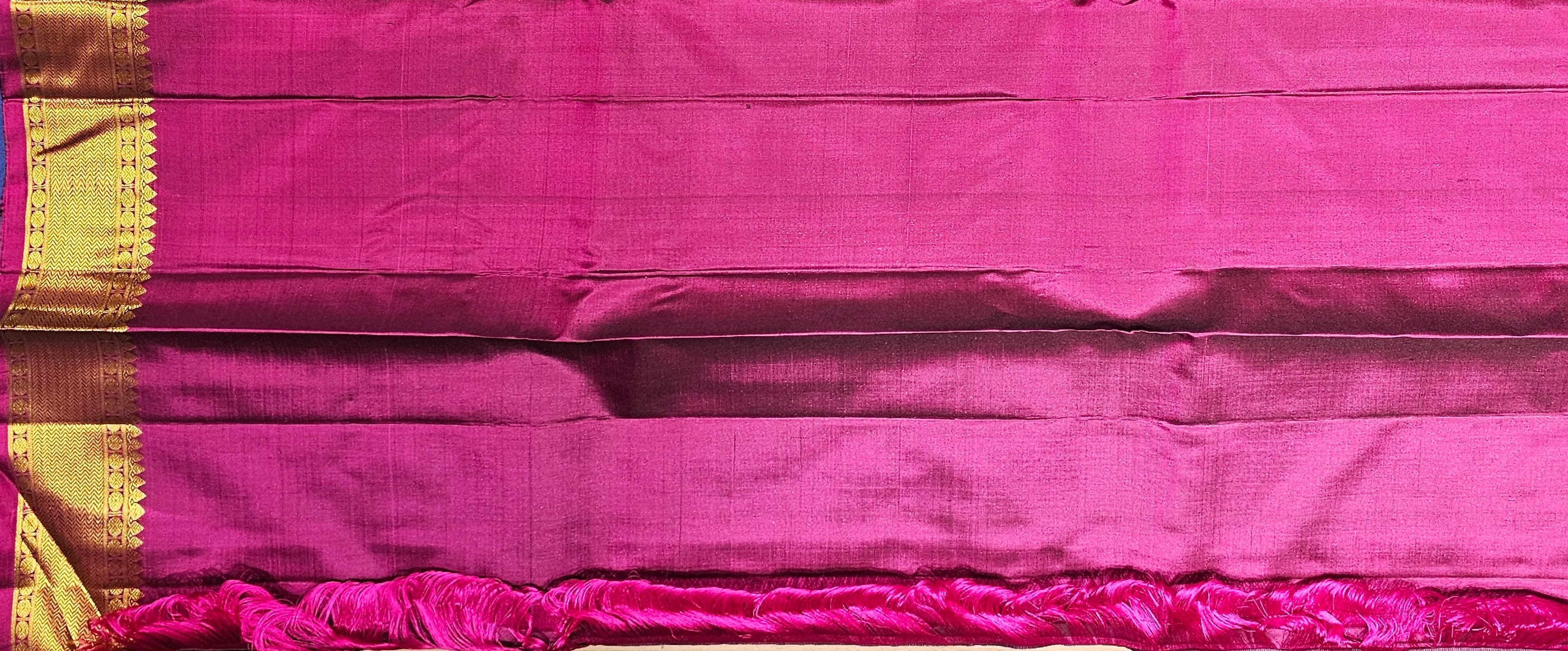 Dark green authentic silk Kanchipuram saree; arangetram meaning embodied in this vibrant bharatanatyam dress.