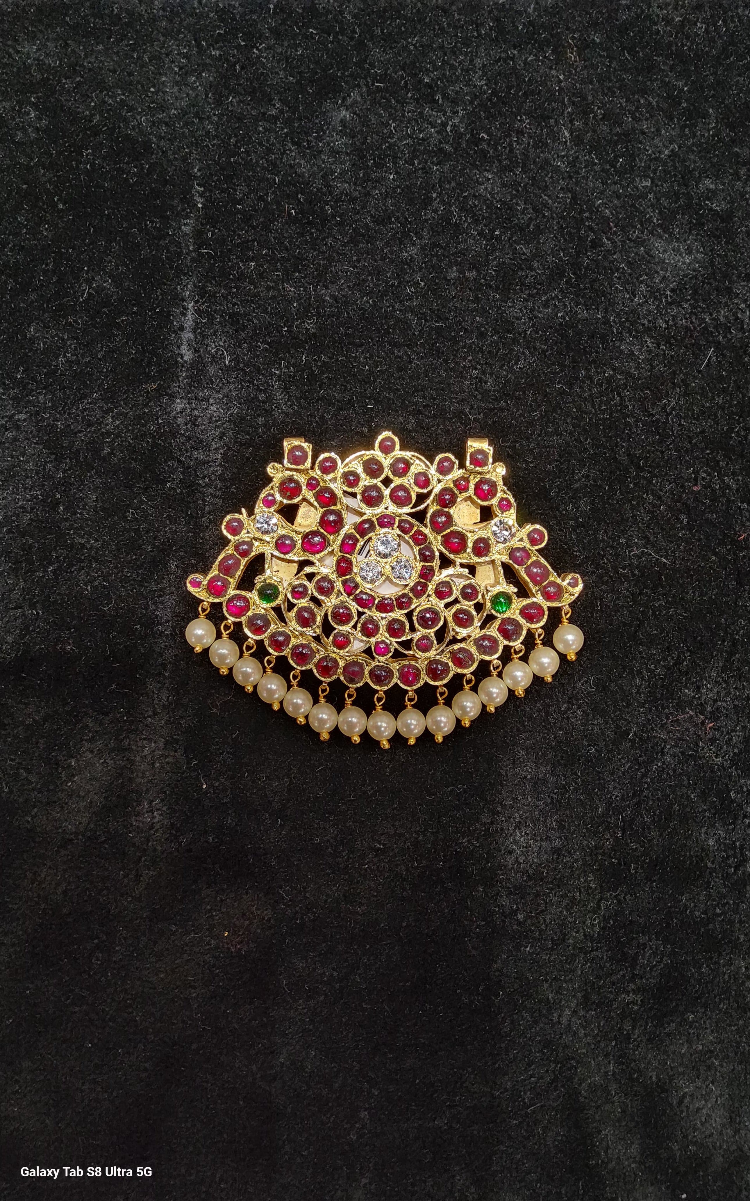 No 5 Pathakkam, original temple jewelry pendant close-up detail.