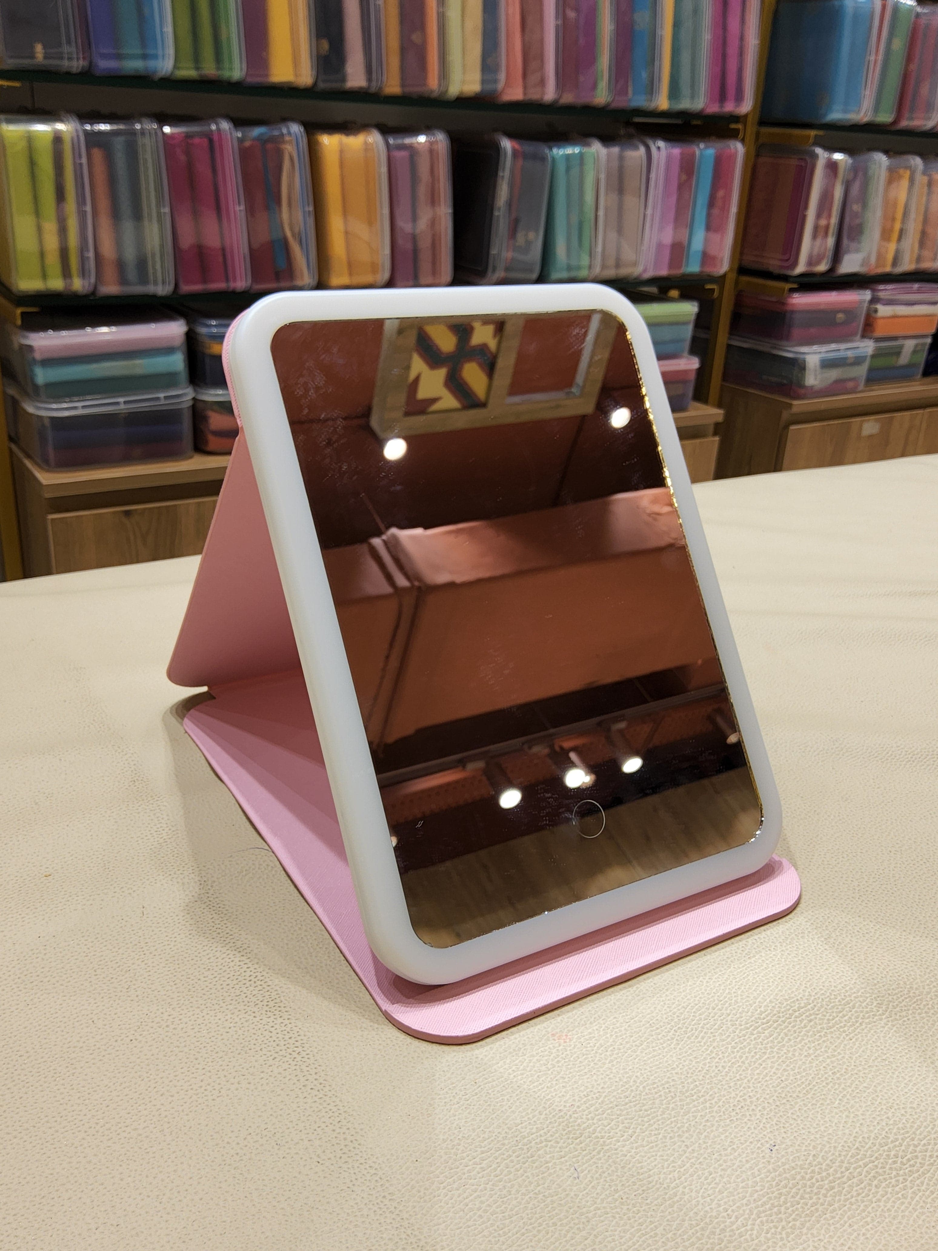 Close-up of Stand Mirror: Adjustable lighting control on portable dance mirror.