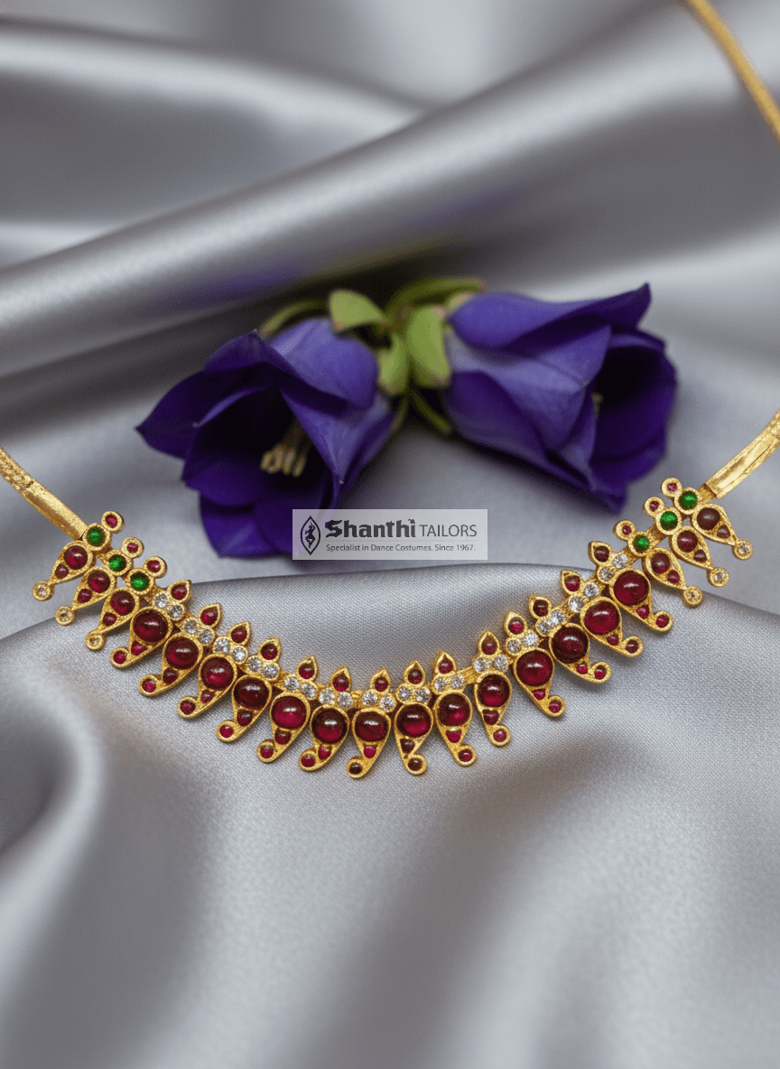 Surul Mnago Pichipoo Choker: Temple Jewellery Necklace, detailed view of mango design.