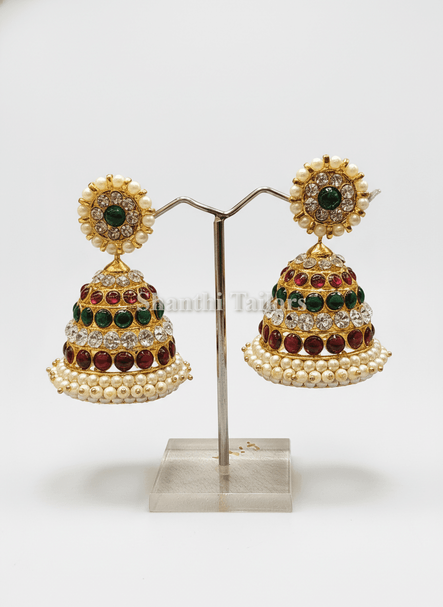 Bharatanatyam jewellery, silver base gold leaf jummiki earrings with pearl accents.