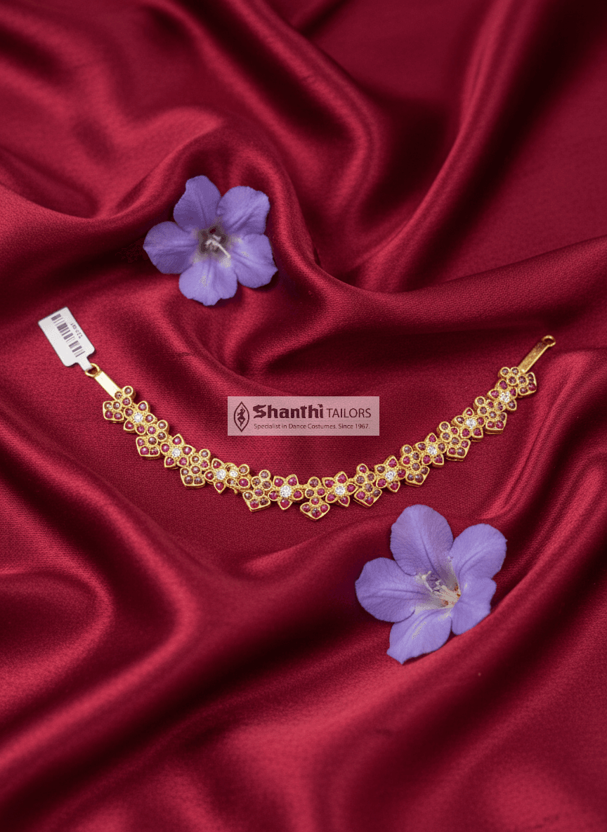 Star and Doll Choker: Gold leafed temple jewelry necklace for Bharatnatyam dancers.