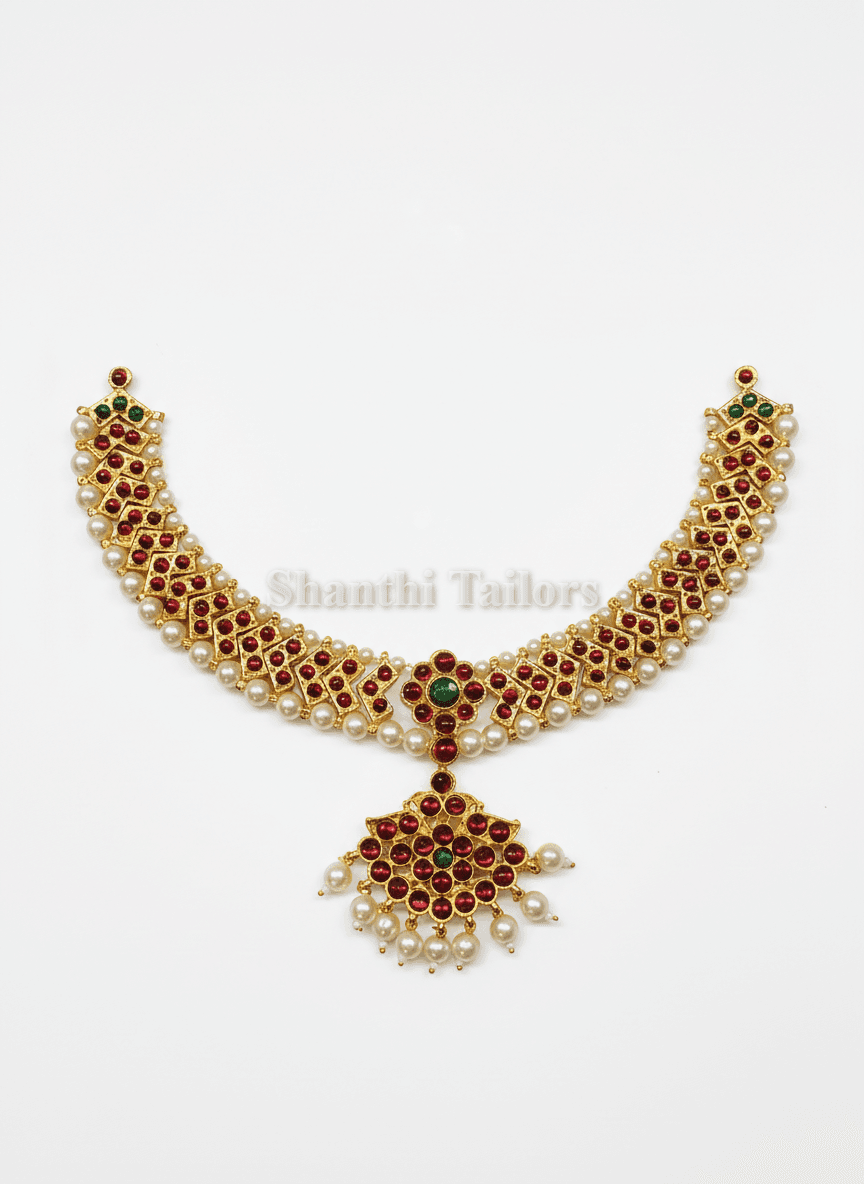 Close-up of silver base gold leaf temple jewelry V necklace, kemp stones and pearls, bharatanatyam jewellery set.