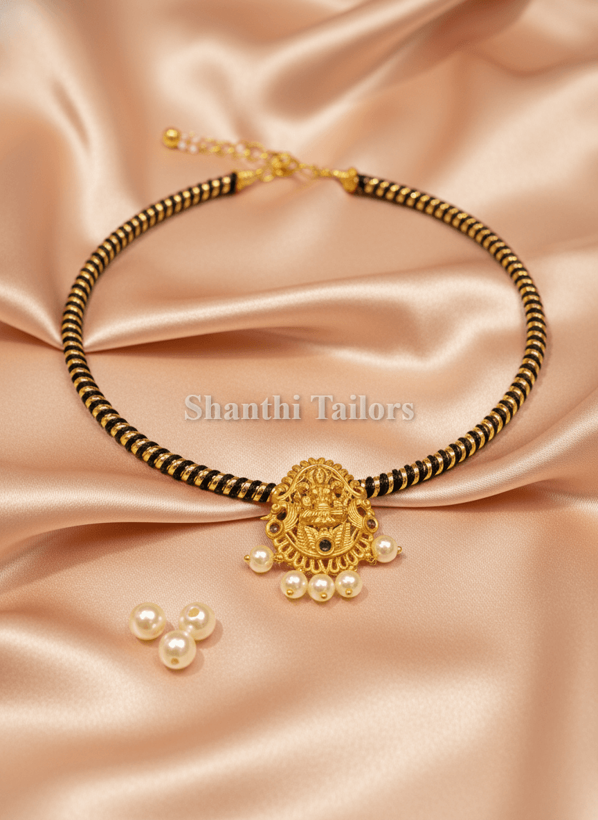 Lakshmi Choker Earrings Set: Close up of Lakshmi pendant detail, gold fashion jewelry, Arangetram look.