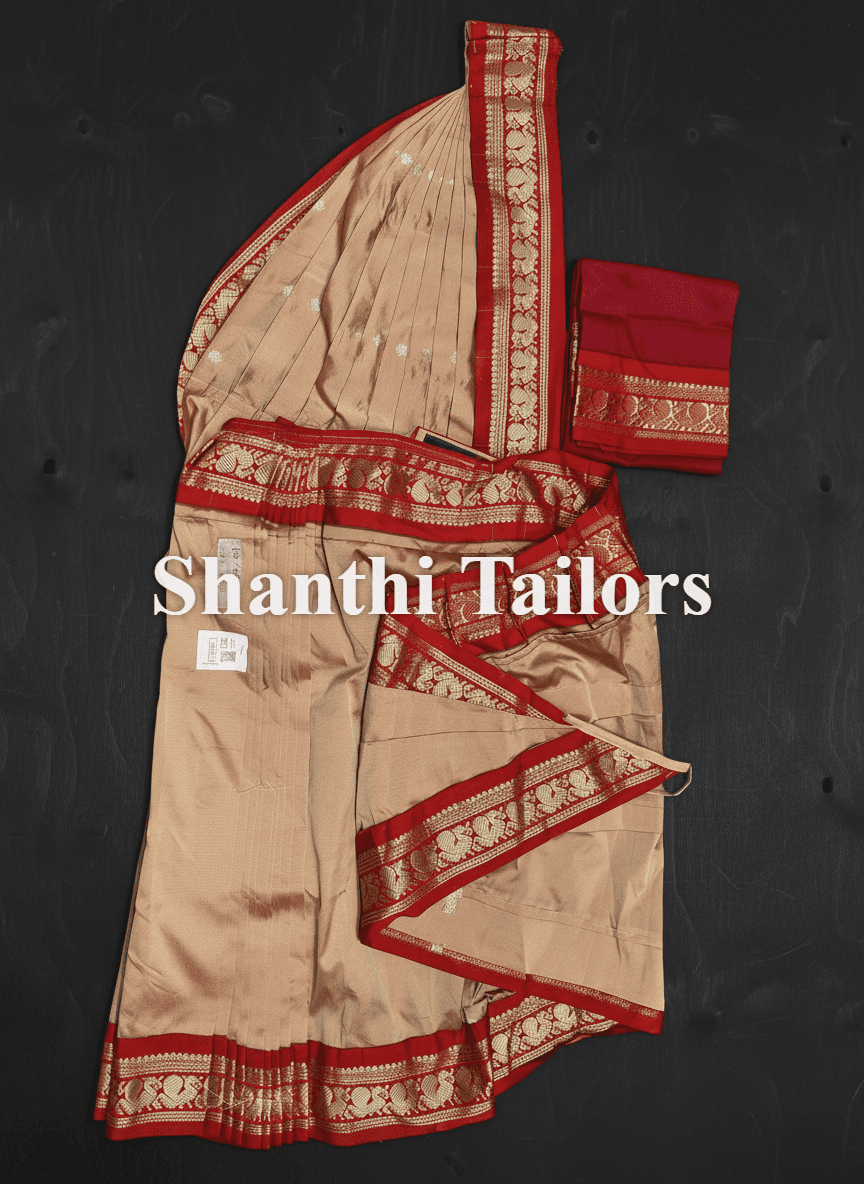 Close-up of temple border on peach authentic silk bharatnatyam practice saree.