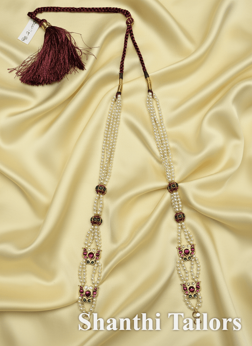 Bharatanatyam dress and temple jewellery. Shanthi Tailors Haram. Silver base gold leaf.