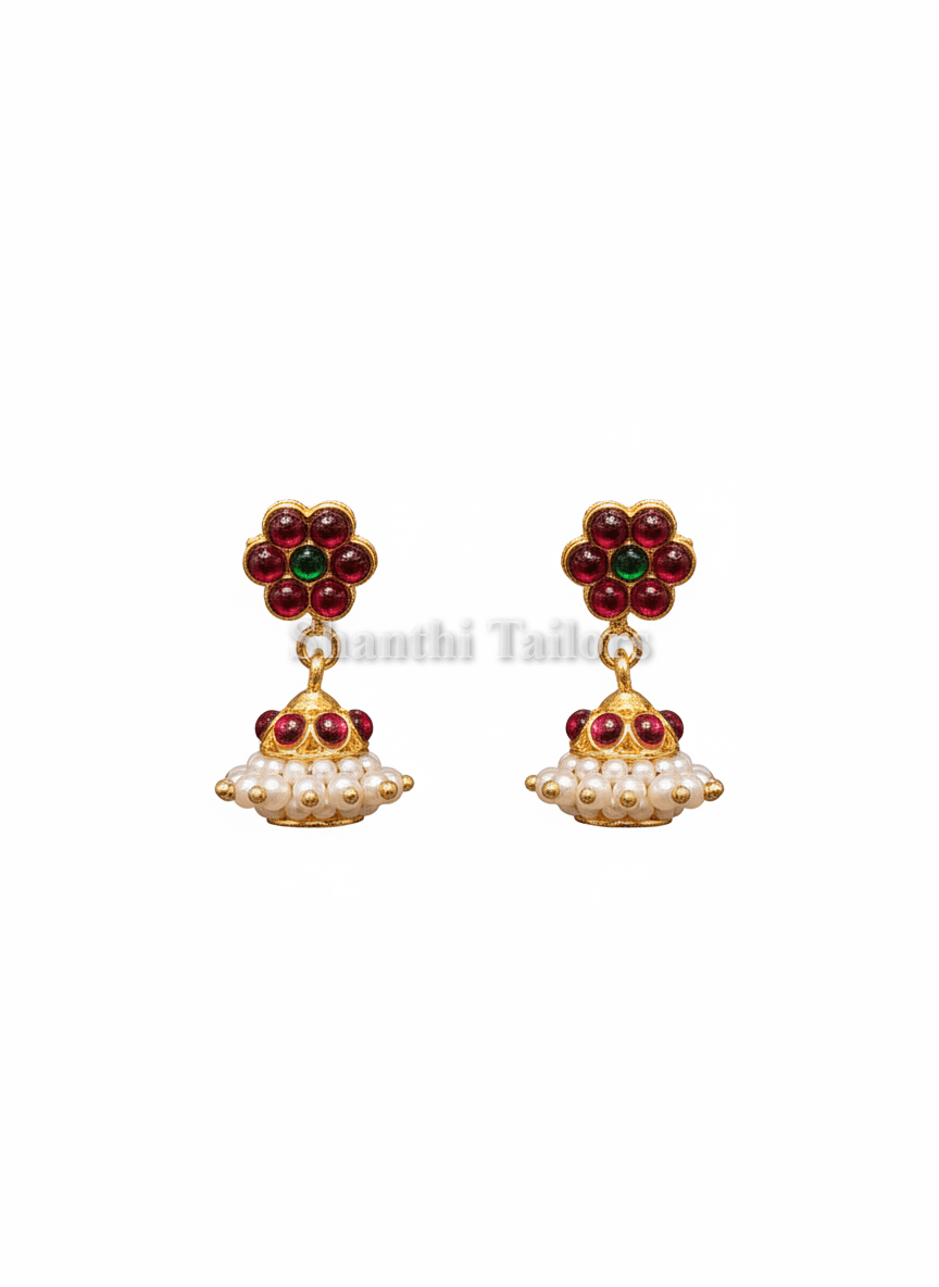Side view of small jummiki earrings, silver base gold leaf temple jewelry, bharatanatyam.