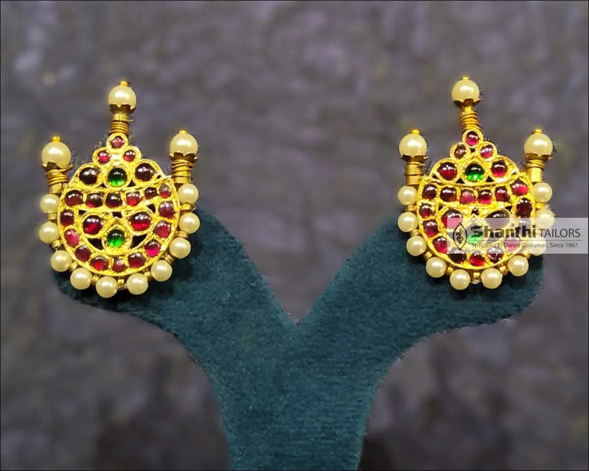 Close-up of Bharatanatyam Stud Earrings. Kemp stone, Gold Leaf finish, Temple Jewellery.