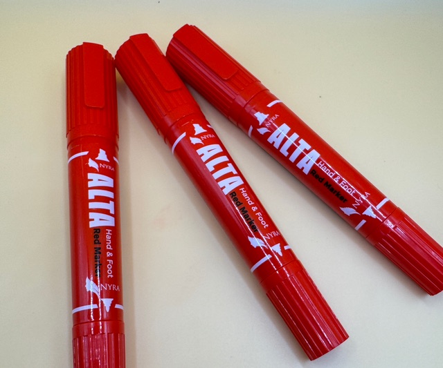 Three NYRA Alta pens, red, with Hand & Foot Red Marker print