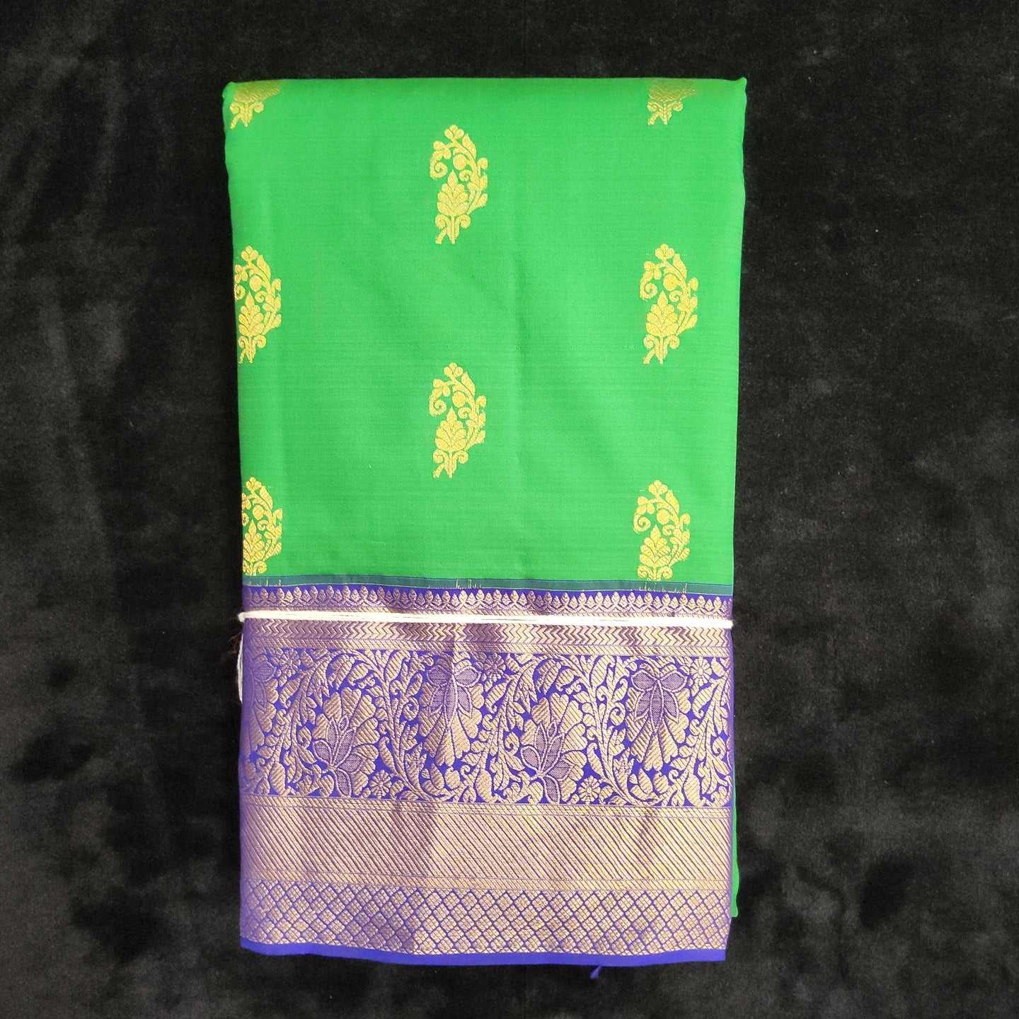 Beautiful lime green Gadwal silk saree with zari buttas. The artistic navy blue  border has zari chevron and very intricate elep… | Silk sarees, Elegant  saree, Saree