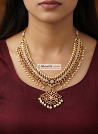 Side view of elegant 3 Stone Chandran Choker, original temple jewellery necklace, pure silver and gold leafing, traditional dancer accessory.